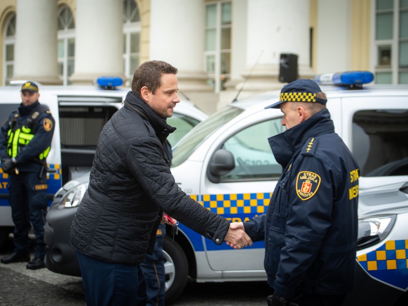 Mayor of Warsaw Rafał Trzaskowski gives electric car to eco patrol officer